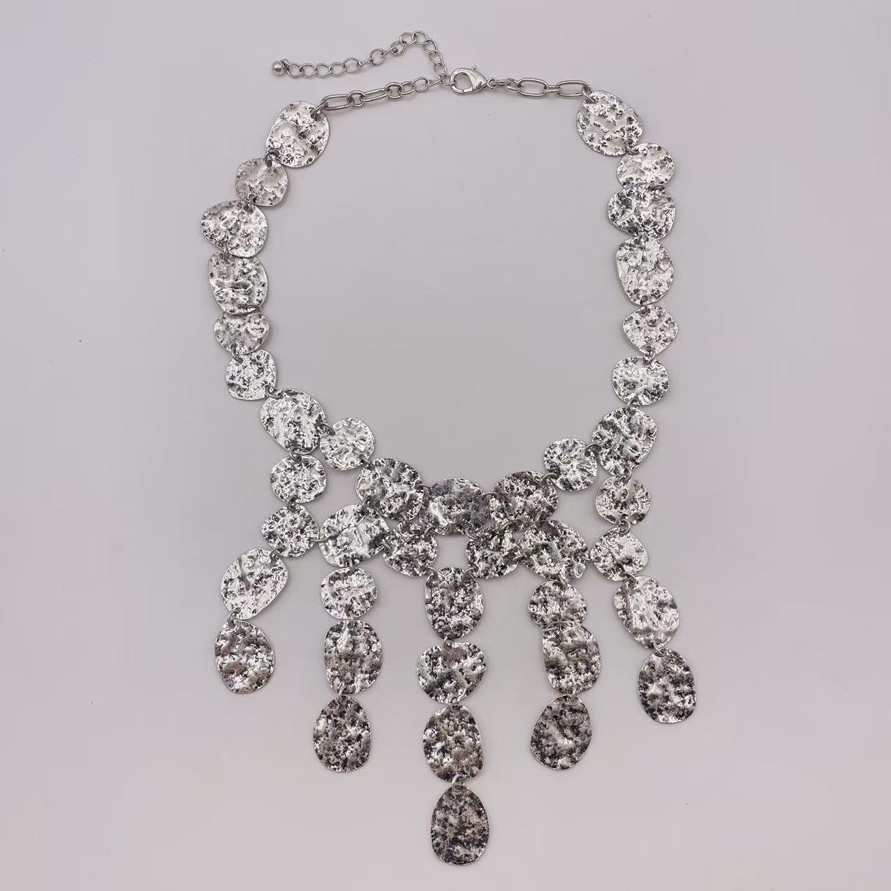 JI JOYA VENTA AL POR MAYOR,Collar de borlas de metal desigual
